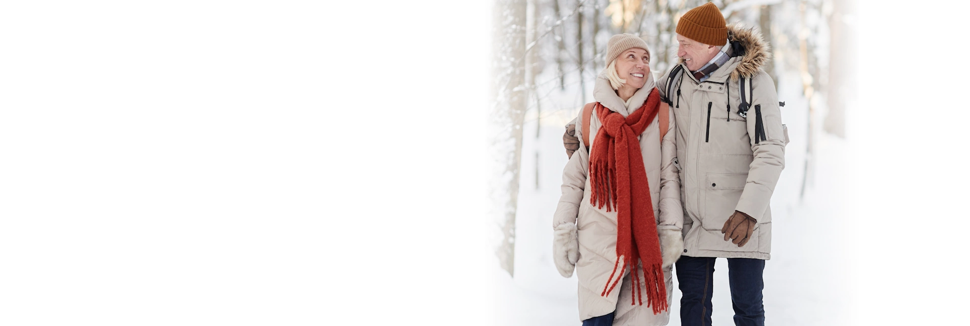 Life Assure Seniors Walking In Winter Forest Home Hero